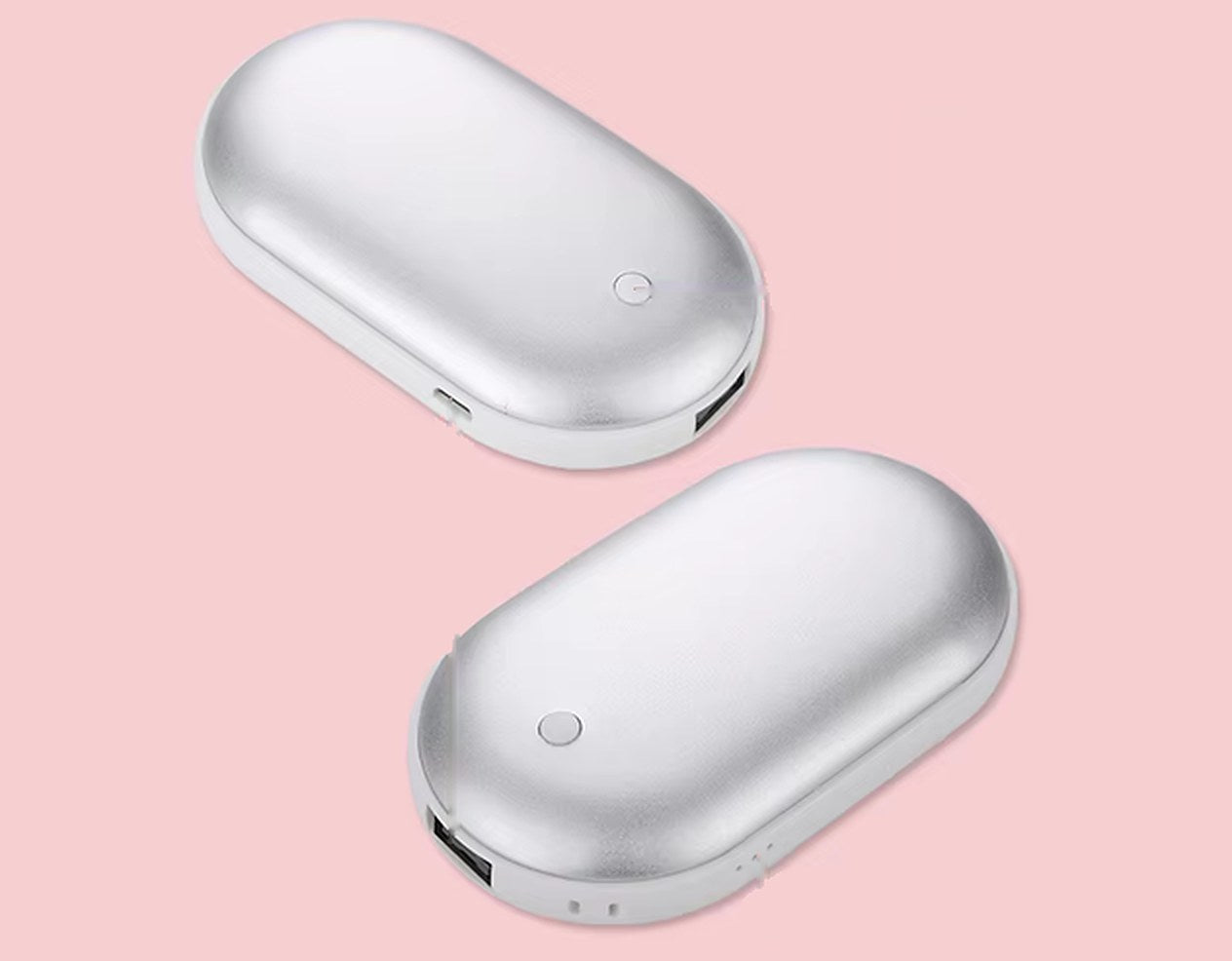 Deux galets SALO vus de dessus, avec le bouton, le port de charge, la sortie USB et le voyant